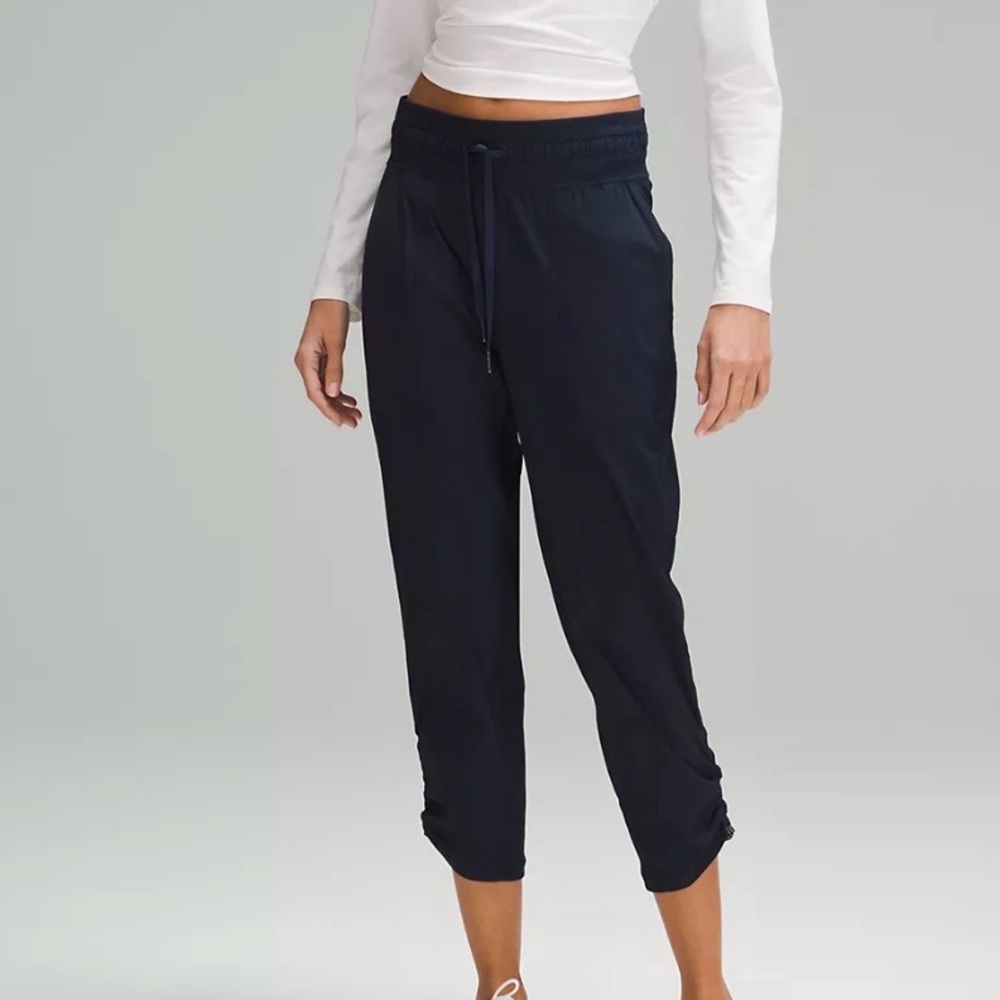Lululemon Dance Studio Mid Rise Cropped navy pants.